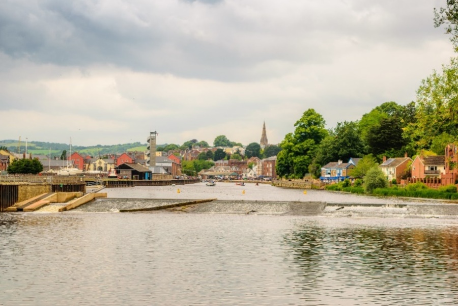 A view of Exeter, with the river Exe in the foreground, looking towards the cathedral.